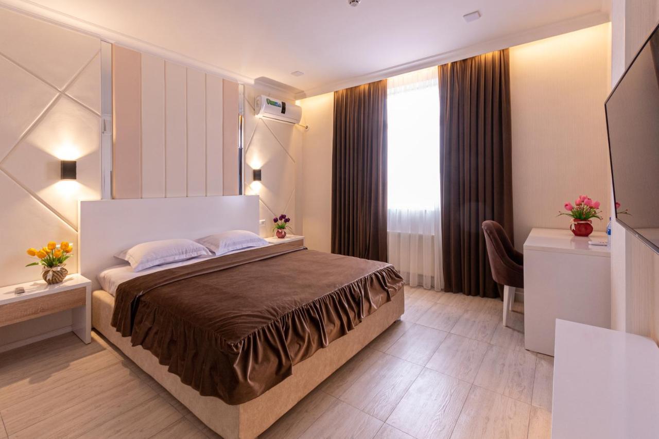 Tantana Hotel Fargʻona Buitenkant foto