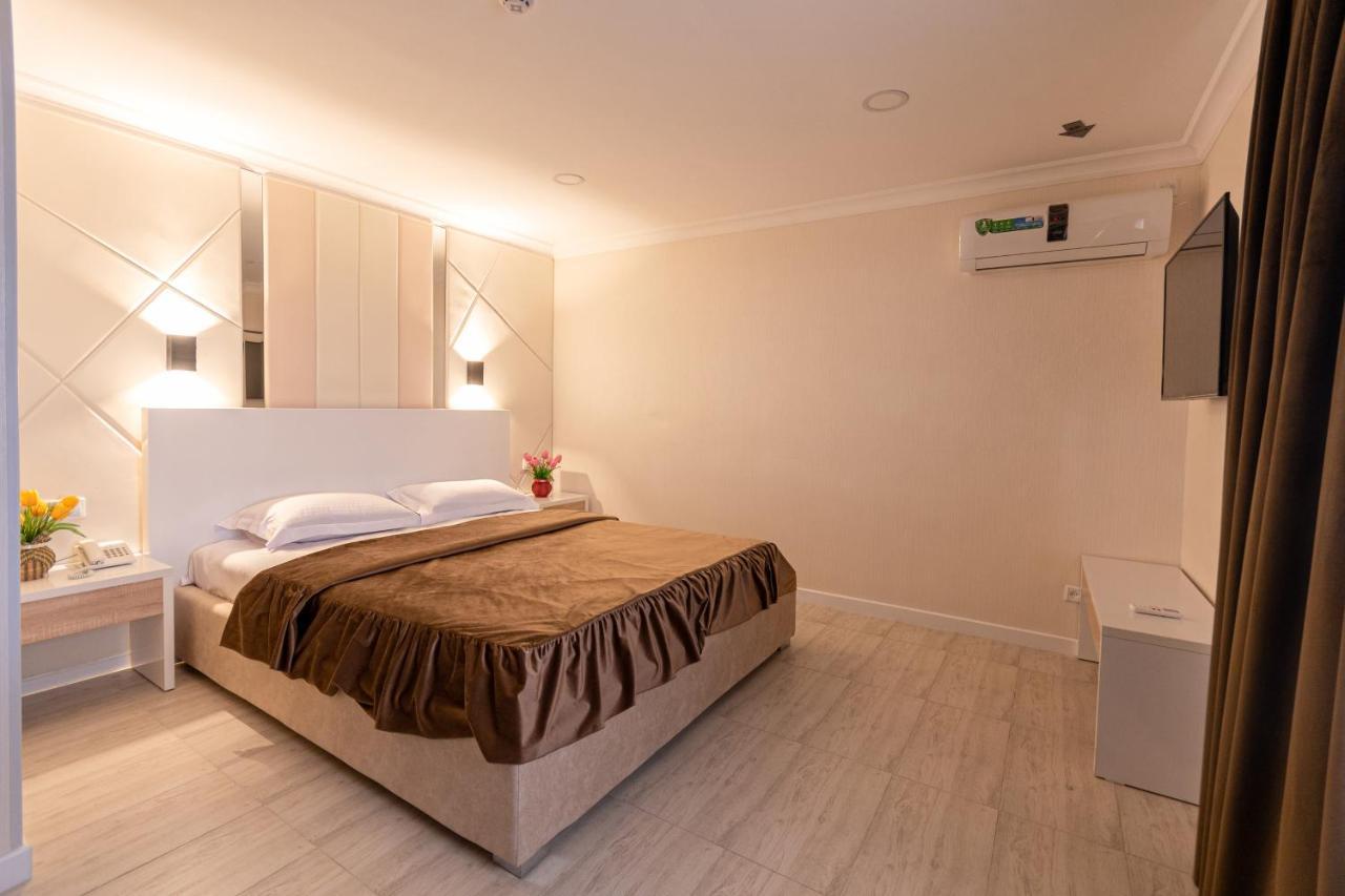 Tantana Hotel Fargʻona Buitenkant foto