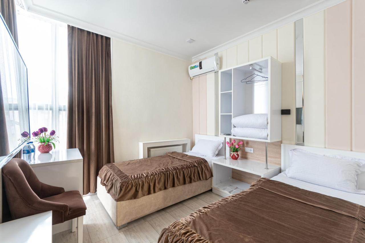 Tantana Hotel Fargʻona Buitenkant foto