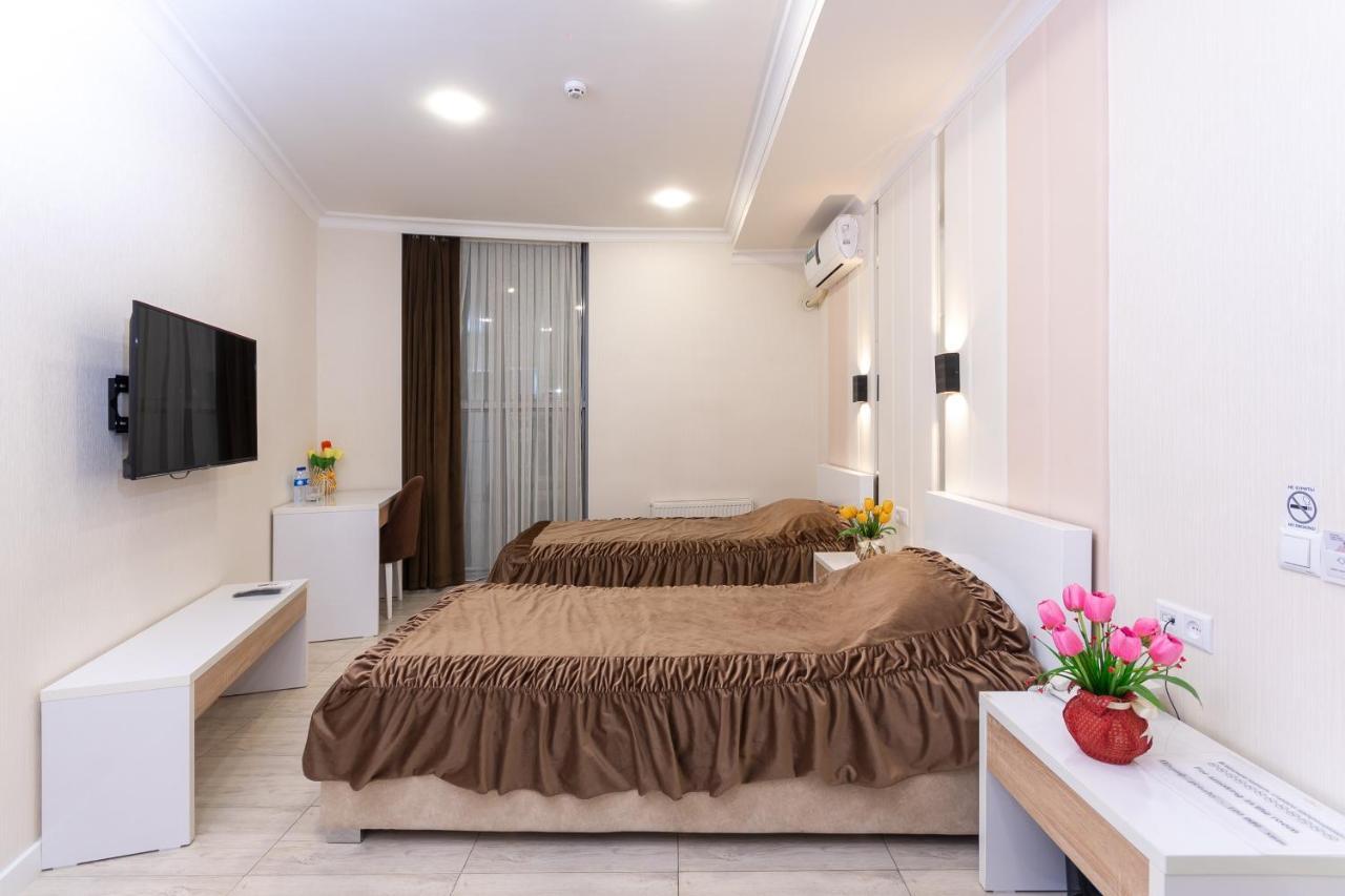 Tantana Hotel Fargʻona Buitenkant foto