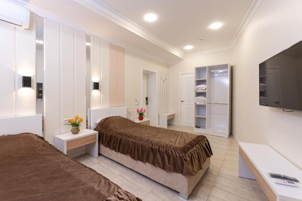 Tantana Hotel Fargʻona Buitenkant foto